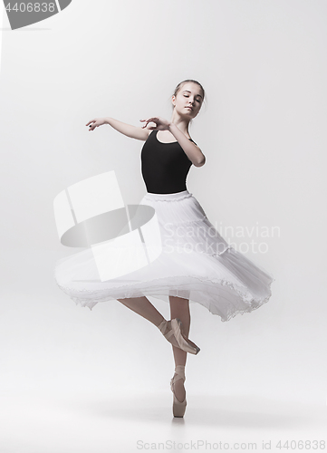 Image of Young classical dancer isolated on white background.