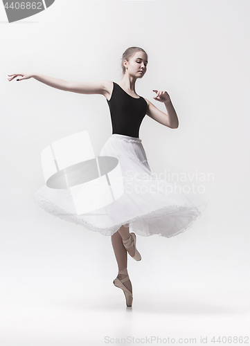 Image of Young classical dancer isolated on white background.