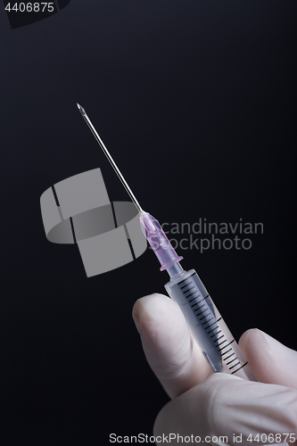 Image of Hand with syringe