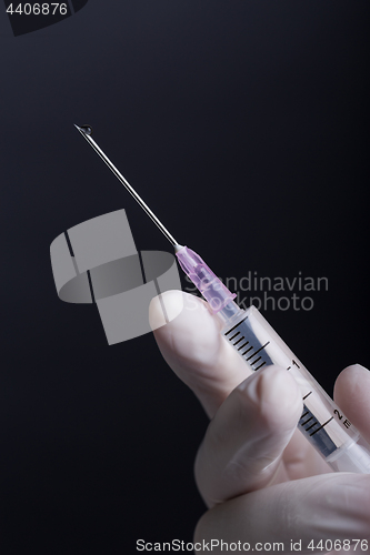 Image of Hand with syringe