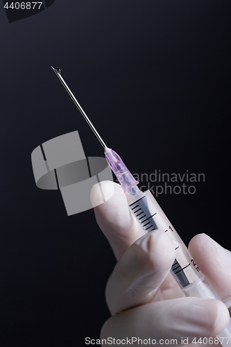 Image of Hand with syringe