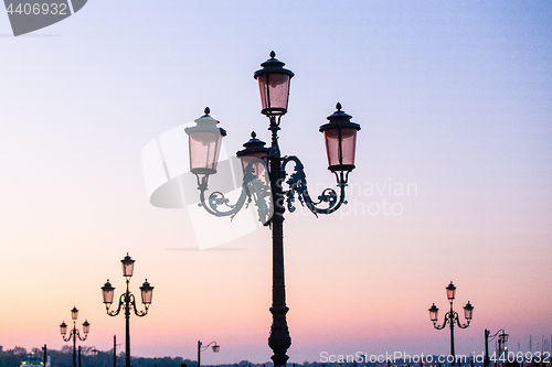 Image of Beautiful street lamps in Venice, Italy at sunrise