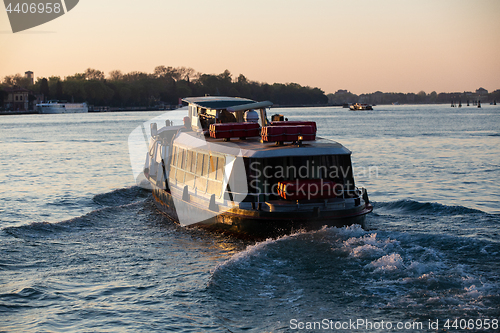 Image of Transportation boat at sunrise in Venice, Italy