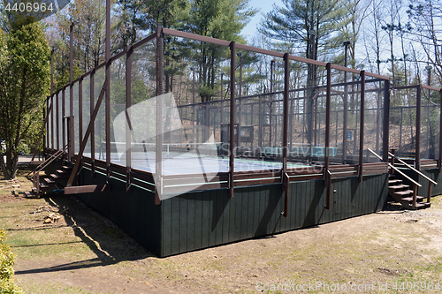 Image of platform paddle tennis court at private suburban club