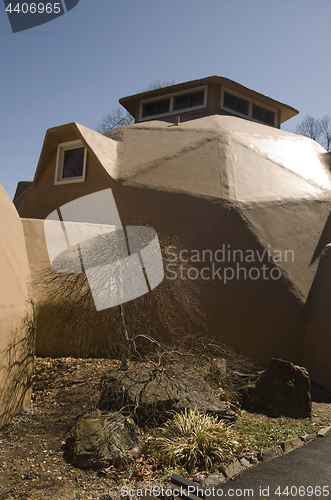 Image of geodesic dome residential house  suburban setting