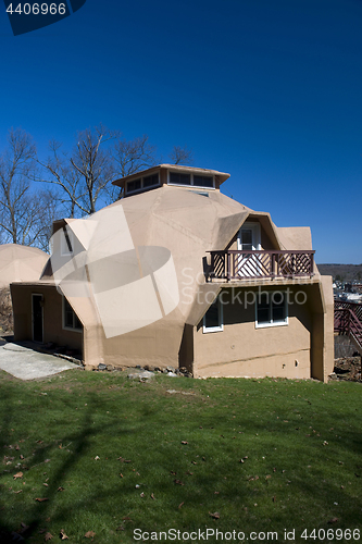 Image of geodesic dome residential house  suburban setting