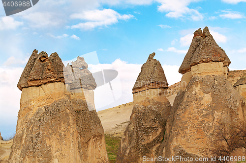 Image of Fairy houses stone cliffs