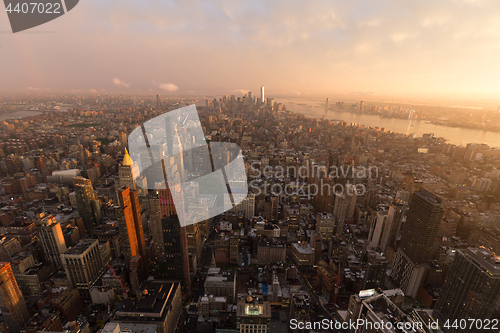 Image of New York City skyline with urban skyscrapers at sunset, USA.