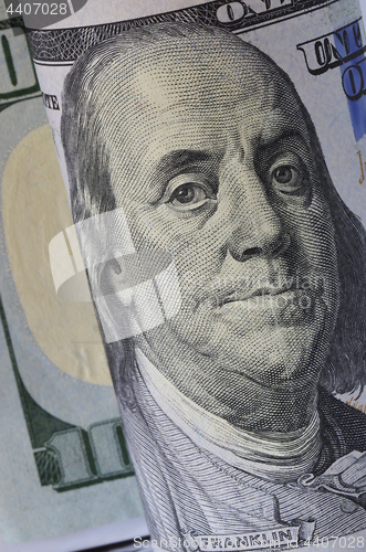 Image of Benjamin Franklin from hundred dollars bill