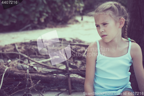 Image of Portrait of one sad little girl. 