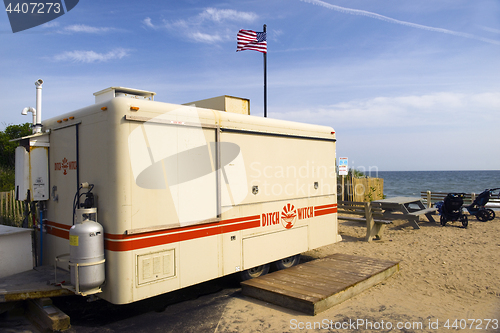 Image of editorial Montauk Ditch Witch food wagon beach 