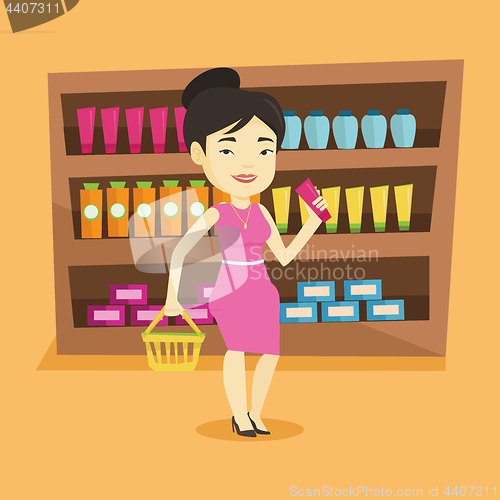 Image of Customer with shopping basket and tube of cream.