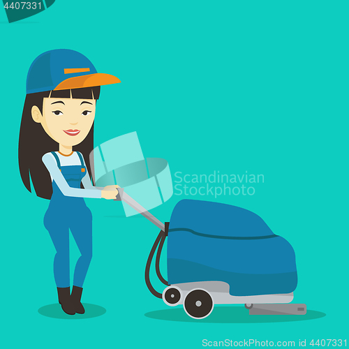 Image of Female worker cleaning store floor with machine.