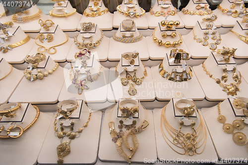 Image of gold jewelry in the shop window