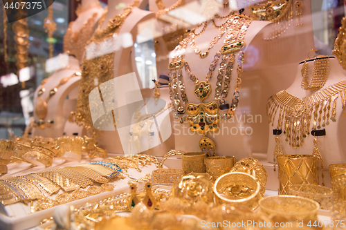 Image of gold jewelry in the shop window