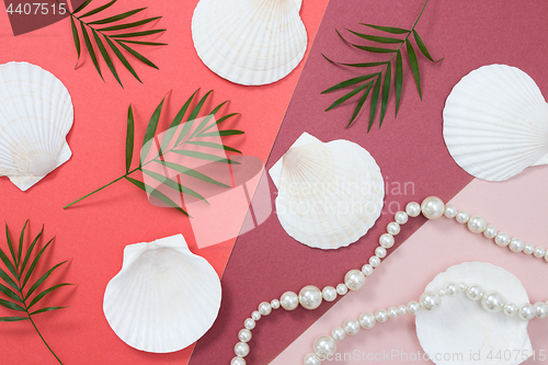 Image of Tropical flat lay with seashells and pearls