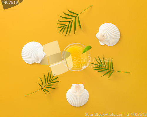 Image of Tropical cocktail on bright summer background