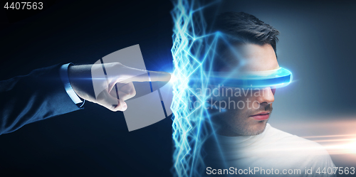 Image of businessman hand connecting to virtual network