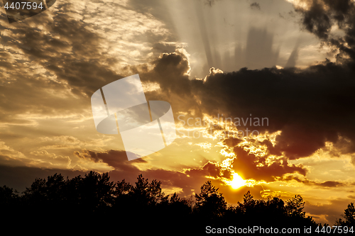 Image of clouds over forest at summer 