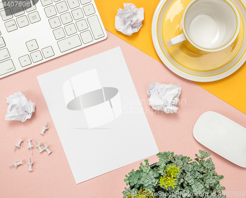Image of Bright summer workspace with blank sheet of paper