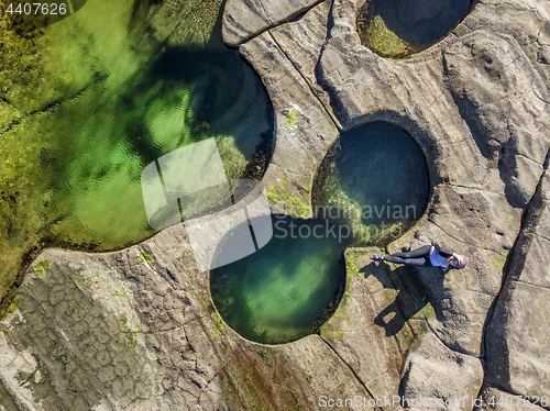 Image of Relaxing poolside, at the seaside and  coastal rock pools