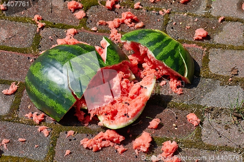 Image of Dropped watermelon on the ground