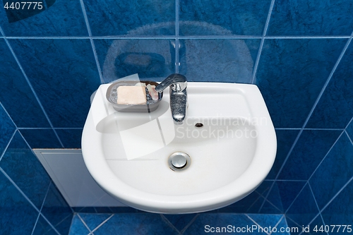Image of Bathroom tap and sink