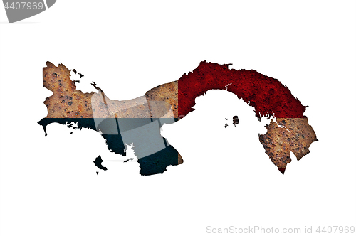 Image of Map and flag of Panama on rusty metal