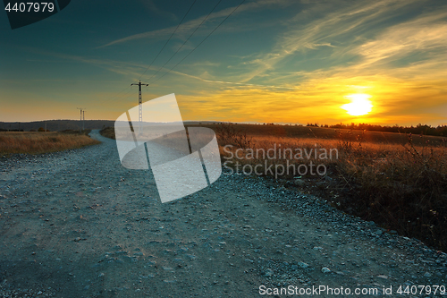 Image of rural road at sunset
