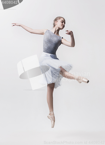 Image of Young classical dancer isolated on white background.