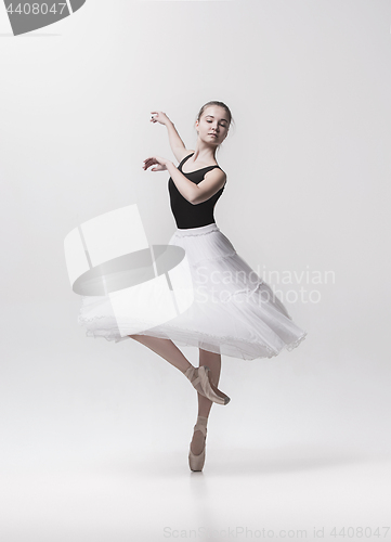 Image of Young classical dancer isolated on white background.