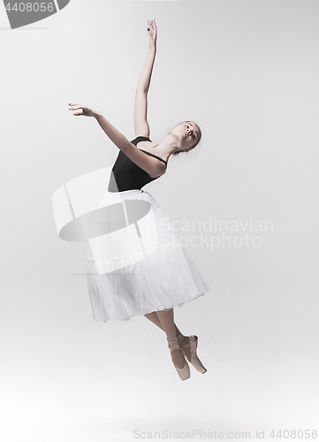 Image of Young classical dancer isolated on white background.