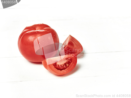 Image of The fresh tomatoes on white background