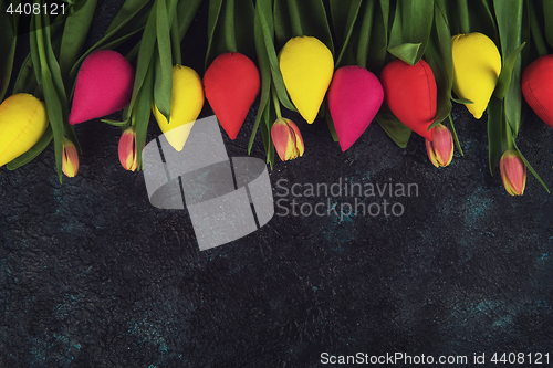 Image of Handmade and real tulips on darken