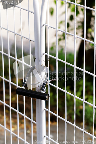 Image of Locked white gate