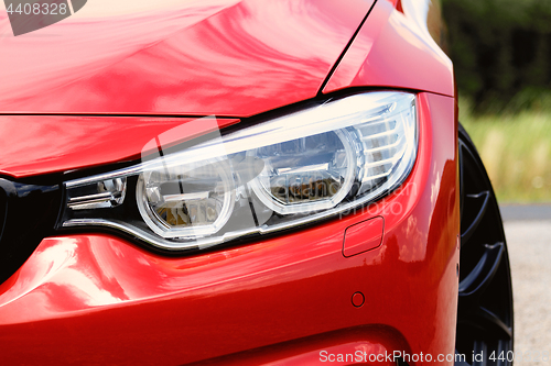 Image of Red sports car headlight