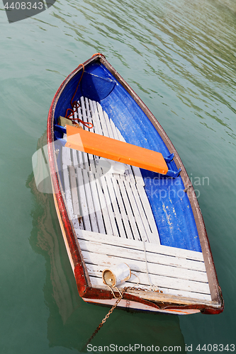 Image of Old wooden boat on the lake