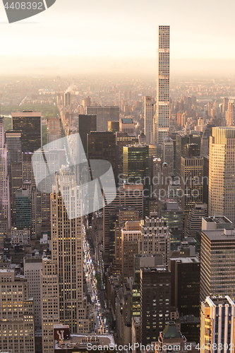 Image of New York City skyline with urban skyscrapers at sunset, USA.