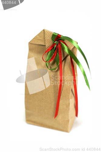 Image of brown gift bag with ribbons