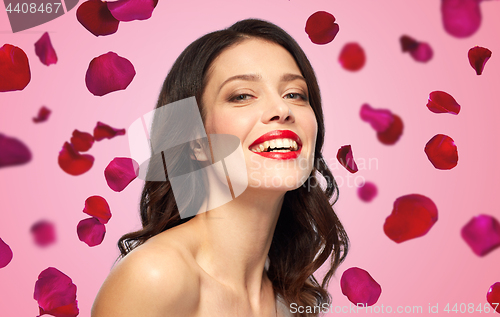 Image of beautiful smiling young woman with red lipstick