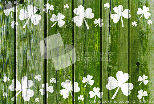 Image of shamrock pattern on old green wooden boards