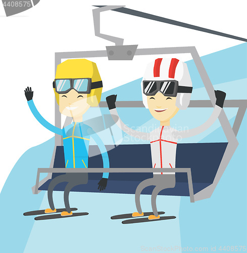 Image of Two happy skiers using cableway at ski resort.