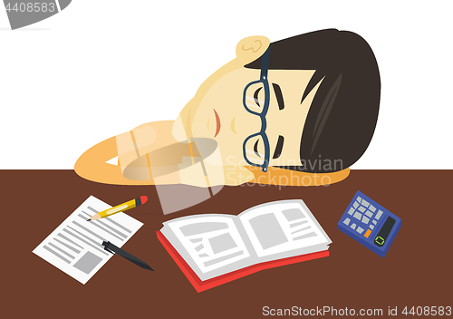 Image of Student sleeping at the desk with book.