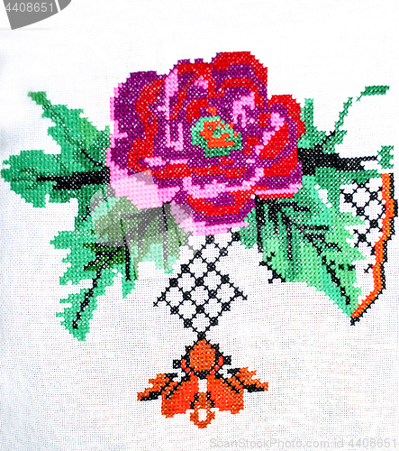 Image of embroidered flower rose