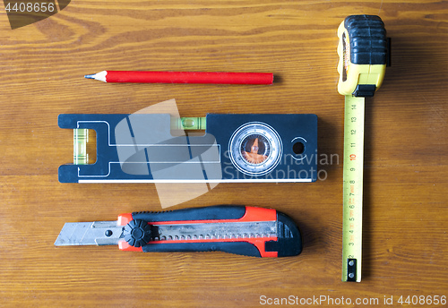 Image of construction tools lying on the table