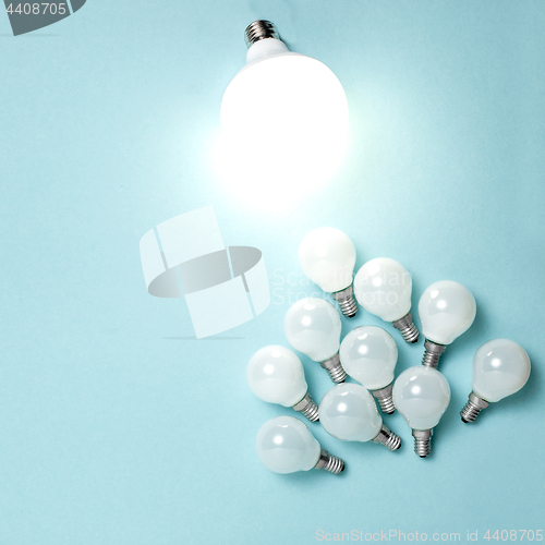 Image of One light bulb outstanding, glowing different. Business creativity idea concepts.