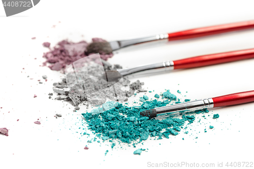 Image of The colored eyeshadow crushed on white close up for background