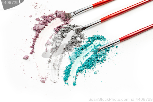 Image of The colored eyeshadow crushed on white close up for background