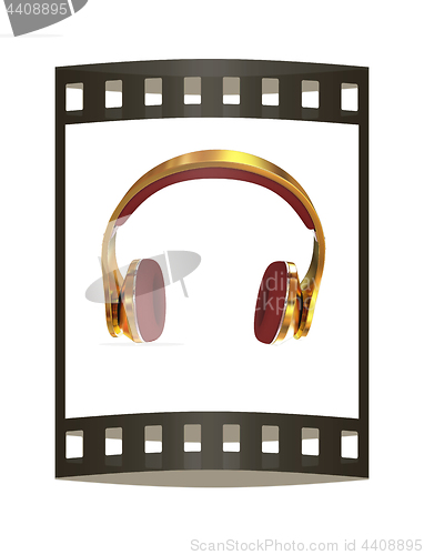 Image of Golden headphones. 3d illustration. The film strip.