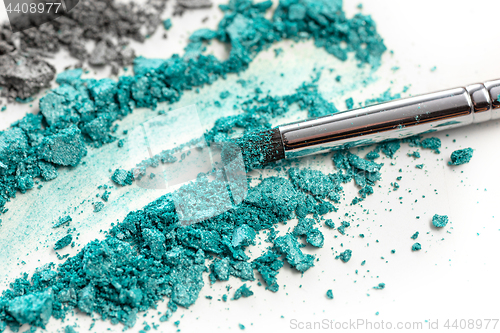 Image of The colored eyeshadow crushed on white close up for background